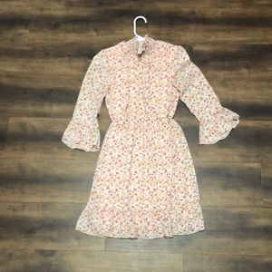 Lightweight spring/summer dress. Coral pink color with flowers all over.